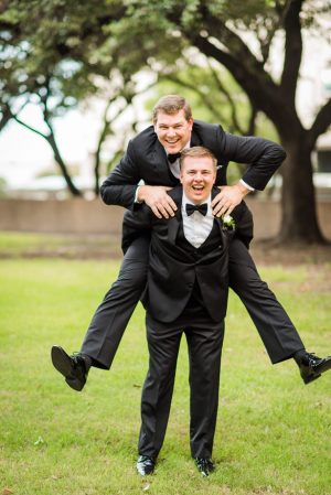 Groomsmen fun photo - Classic Blush Wedding at The Houston Club - Nate Messarra Photography