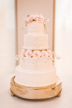 White buttercream wedding cake with pink sugar flowers - Classic Blush Wedding at The Houston Club - Nate Messarra Photography