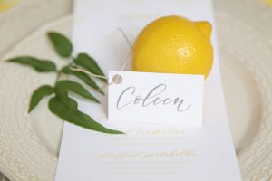 Yellow wedding place setting with lemon place card - Photography: Szu Designs, Inc