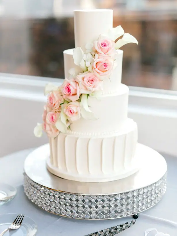 classic white wedding cake with roses - Sarah Nichole Photography