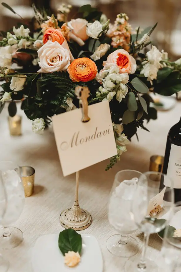 Low wedding centerpiece and table number - Mann and Wife Photography