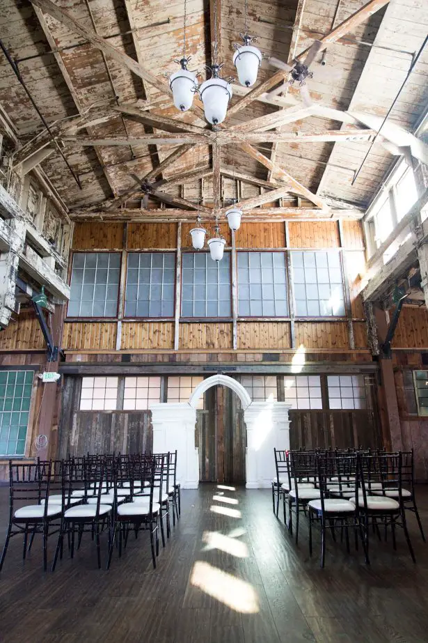 Vintage Wedding ceremony decor in an Industrial Space - Photography: Szu Designs, Inc