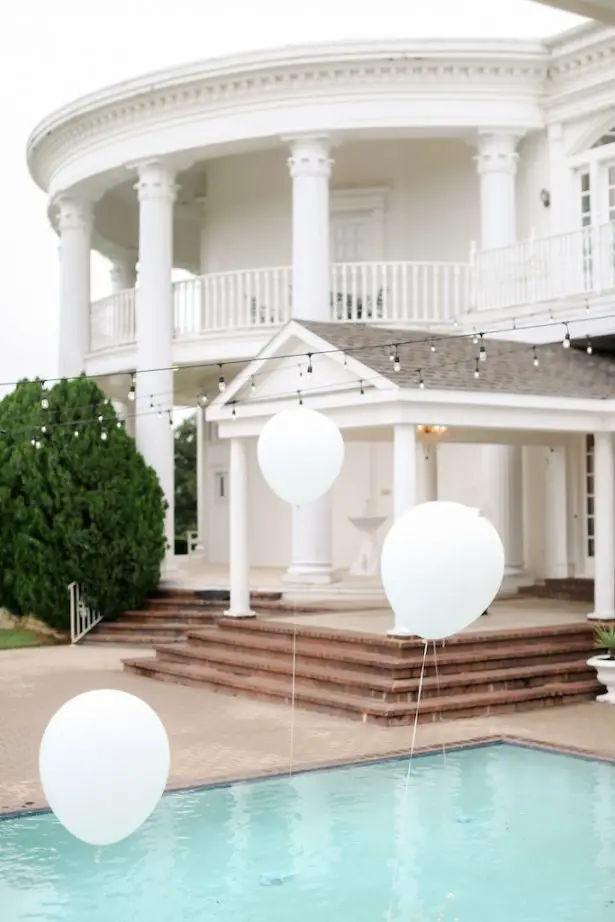 Pool Wedding decor with white balloons - Krystle Akin Photography