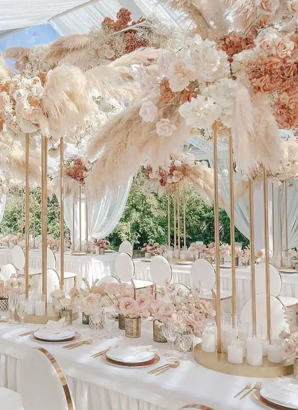 Featured image of post Wedding Centerpieces With Pampas Grass - Hanging installations and tall centerpieces of pampas grass and eucalyptus, and short centerpieces of dahlia and protea, all hana floral design.