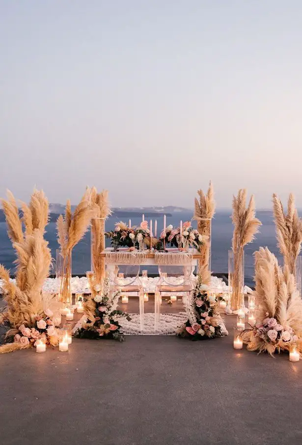 Pampas grass wedding decor with sweetheart table - Phosart Photography