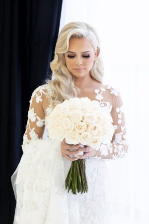 Sophisticated bride with white rose wedding bouquet- Rafal Ostrowski Photography