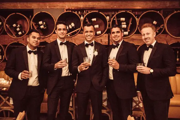 Groom and groomsmen in classic black tuxedos - Robbie Ziegler Photography