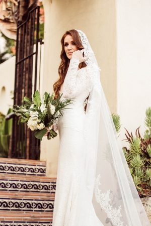 Sophisticated bride with Lace long sleeve wedding dress - Robbie Ziegler Photography
