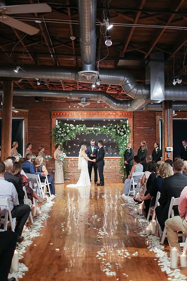 Wedding ceremony decor with greenery arch - Soul Creations Photography