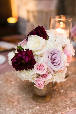Pink purple and white reception centerpiece A Glamorous Wedding with Fireworks - Rachael Hall Photography