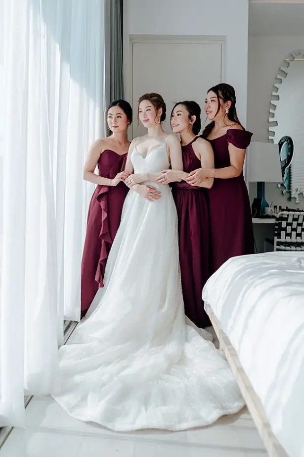 Classy photo of bride with bridesmaids - Madiow Photography