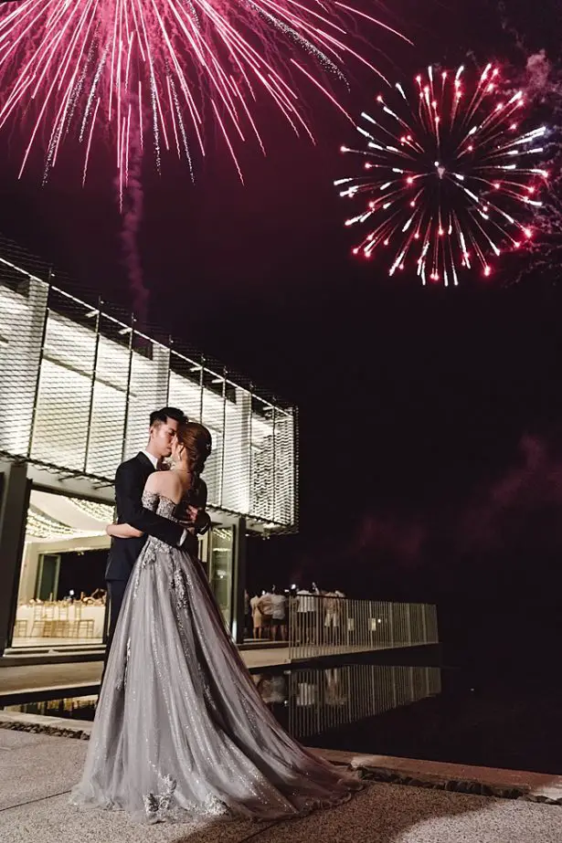 Wedding firework photo with bride and groom - Madiow Photography
