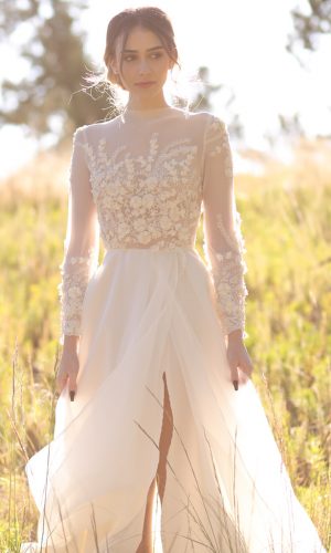 A-line wedding dress with long sleeves - Photo: Tiffany Hudson Films