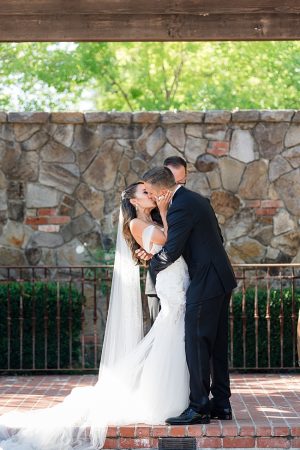 Bride and groom first kiss photo in Napa- O’Malley Photography