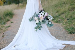 Classic bridal bouquet with greenery and pastel florals - Photo: Tiffany Hudson Films