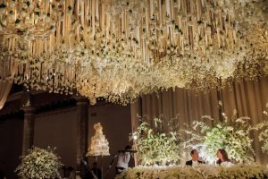 Opulent Luxury Wedding reception decor with hanging flowers - Photography: Vincent Zasil
