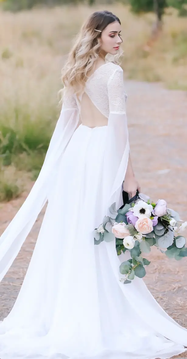 Custom made wedding dress - Photo: Tiffany Hudson Films