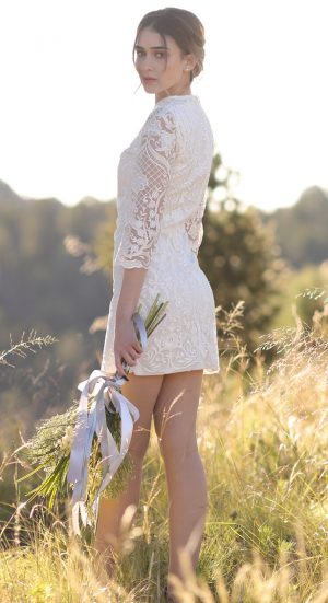 Short lace wedding dress - Photo: Tiffany Hudson Films