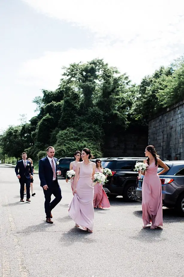 Bridal party walking to wedding ceremony - Bluespark Photography