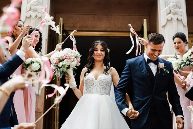 Country Club Wedding exit from ceremony to ribbon wands - Bluespark Photography