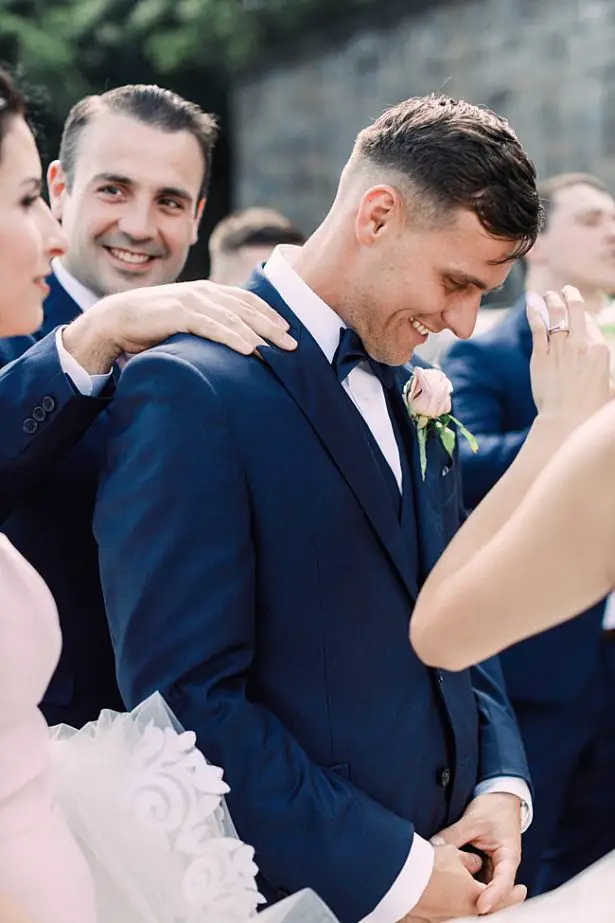 Country Club Wedding shot of groom with groomsmen - Bluespark Photography