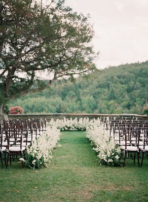 Tuscany Wedding outdoor wedding ceremony with a flower lined aisle- Purewhite Photography