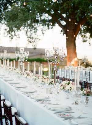 Tuscany Wedding outdoor wedding reception tablescape with candelabras - Purewhite Photography
