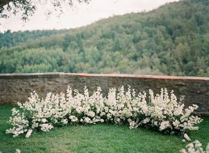 Unique wedding ceremony flower decor overlooking the mountains of Tuscany - Purewhite Photography
