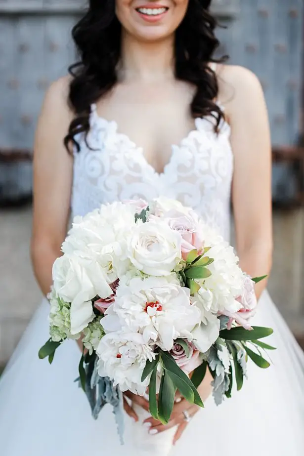 White and pink wedding bouquet with greenery for a classy country club wedding - Bluespark Photography