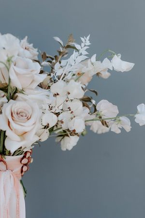 Boho white wedding bouquet with pink ribbons- Foolishly Rushing In Photography