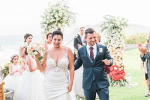 Bride and groom walking down the aisle - Photography: JBJ Pictures
