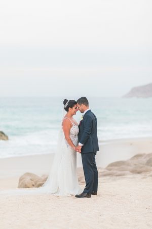 Cabo Destination Wedding photo of bride and groom on the beach - Photography: JBJ Pictures