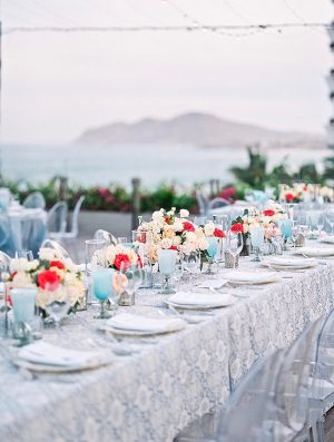 Cabo Destination Wedding reception overlooking the ocean main table setup - Photography: JBJ Pictures