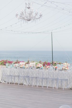 Cabo Destination Wedding reception overlooking the water with string lights - Photography: JBJ Pictures