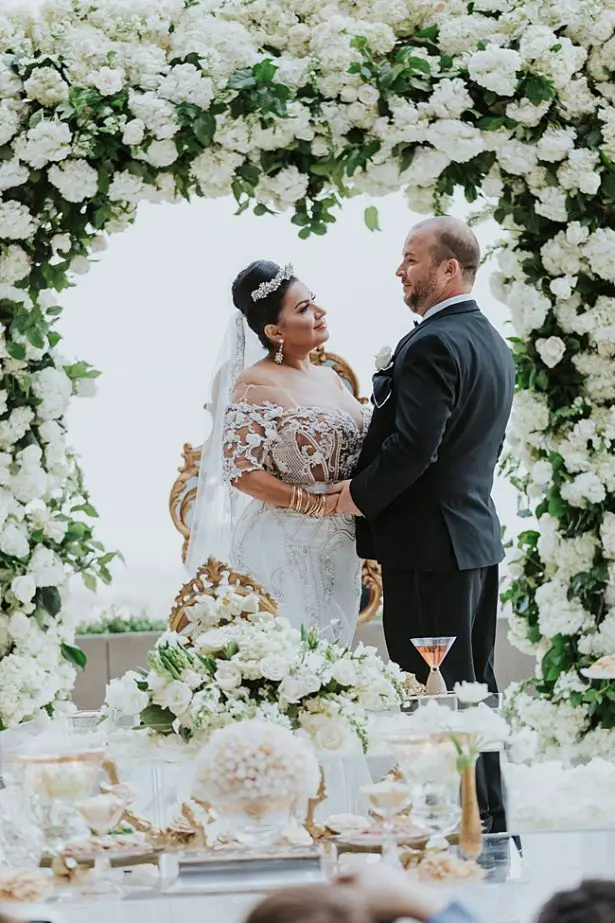 Classy black tie wedding attire for bride and groom - Photo: Dmitry Shumanev Production