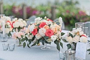 Peach and white wedding reception table centerpiece - Photography: JBJ Pictures