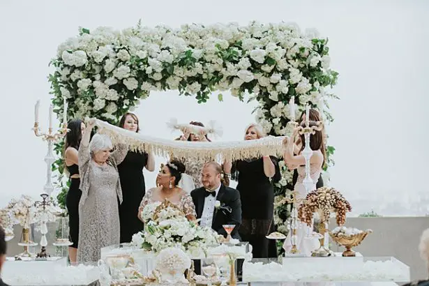Persian wedding ceremony with floral arch - Photo: Dmitry Shumanev Production
