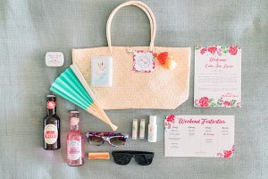Unique guest welcome bag for Cabo Destination Wedding with fan and drinks - Photography: JBJ Pictures
