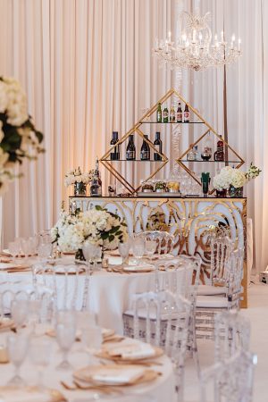 White and Gold Opulent Wedding bar setup - Photo: Dmitry Shumanev Production