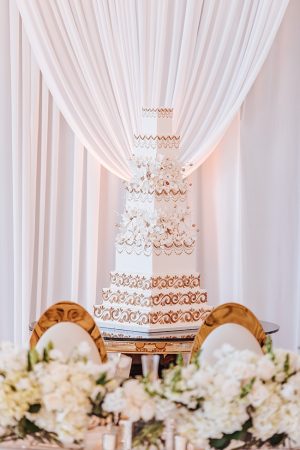 White and Gold Opulent Wedding cake table - Photo: Dmitry Shumanev Production