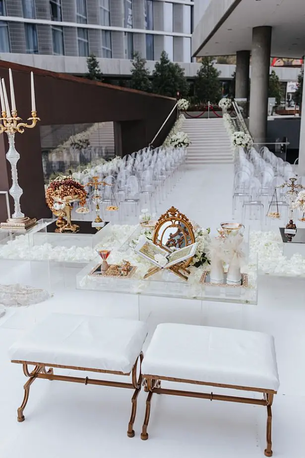 Persian wedding decoration with white Sofreh Agd Muslim ceremony spread - Photo: Dmitry Shumanev Production