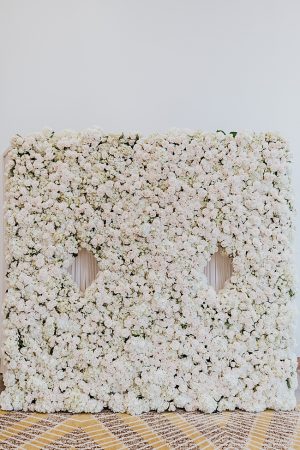White and Gold Opulent Wedding flower wall for reception - Photo: Dmitry Shumanev Production