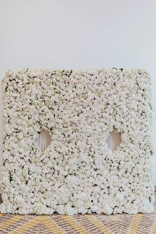White and Gold Opulent Wedding flower wall for reception - Photo: Dmitry Shumanev Production