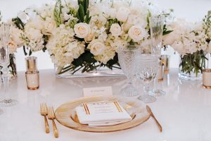 White and Gold Opulent Wedding reception centerpieces with white flowers - Photo: Dmitry Shumanev Production