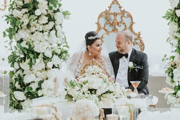 White Opulent Wedding with bride and groom - Photo: Dmitry Shumanev Production