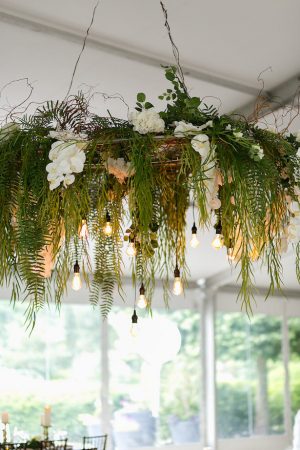 Greenery wedding chandelier - Photography: Emilia Jane