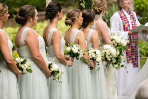 Matching light green bridesmaid dresses - Photography: Emilia Jane
