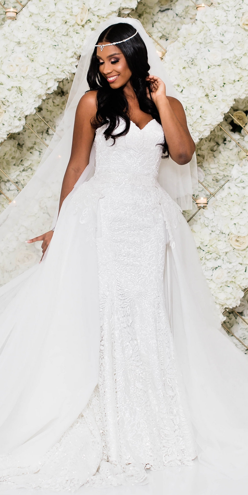 African American bride with a lace strapless wedding dress with overskirt - Photography: Pharris Photos