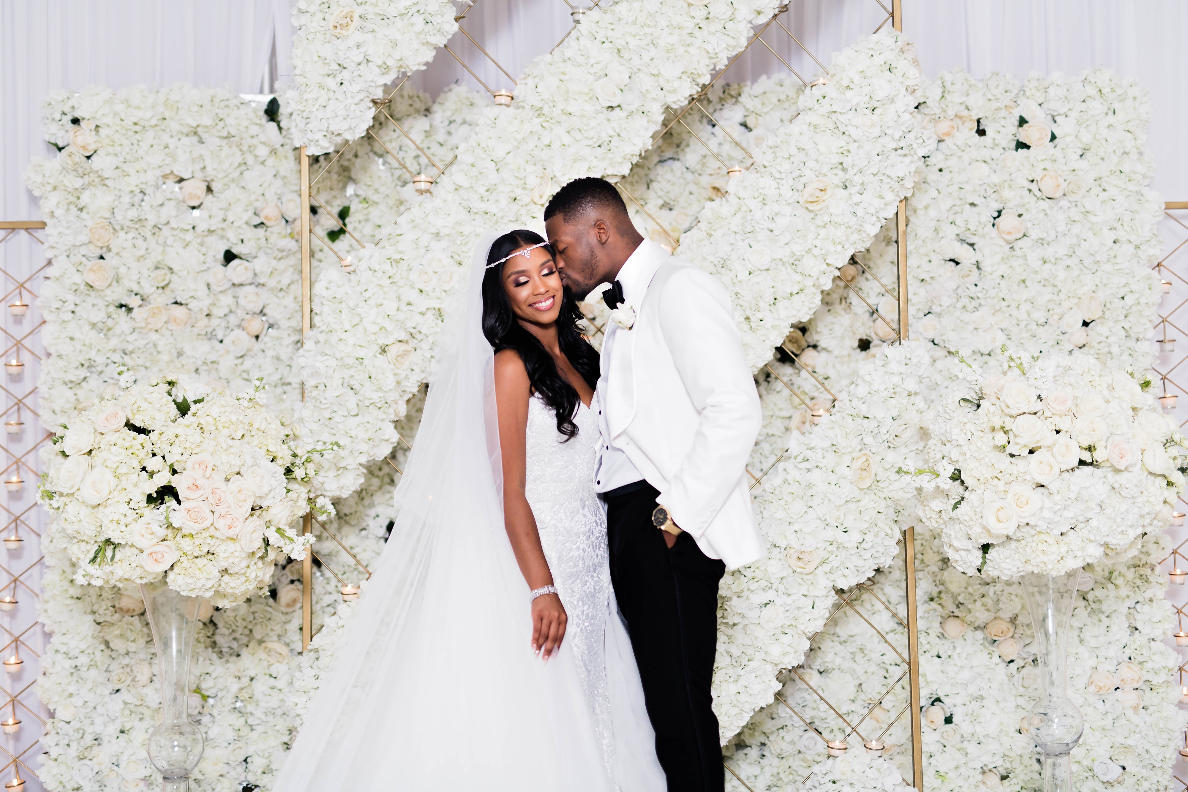 Black bride and groom at their luxury wedding in Houston - Photography: Pharris Photos