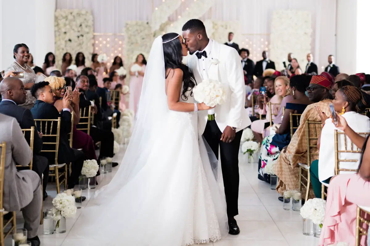 Luxury black bride and African American groom photo at their ceremony - Photography: Pharris Photos